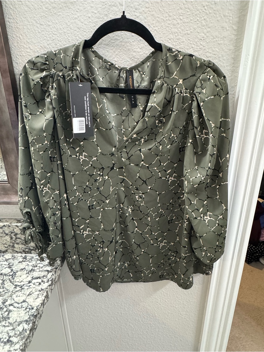 Poshmark title: NWT Renee C Olive Abstract V-Neck Tie Sleeve Blouse Size S
